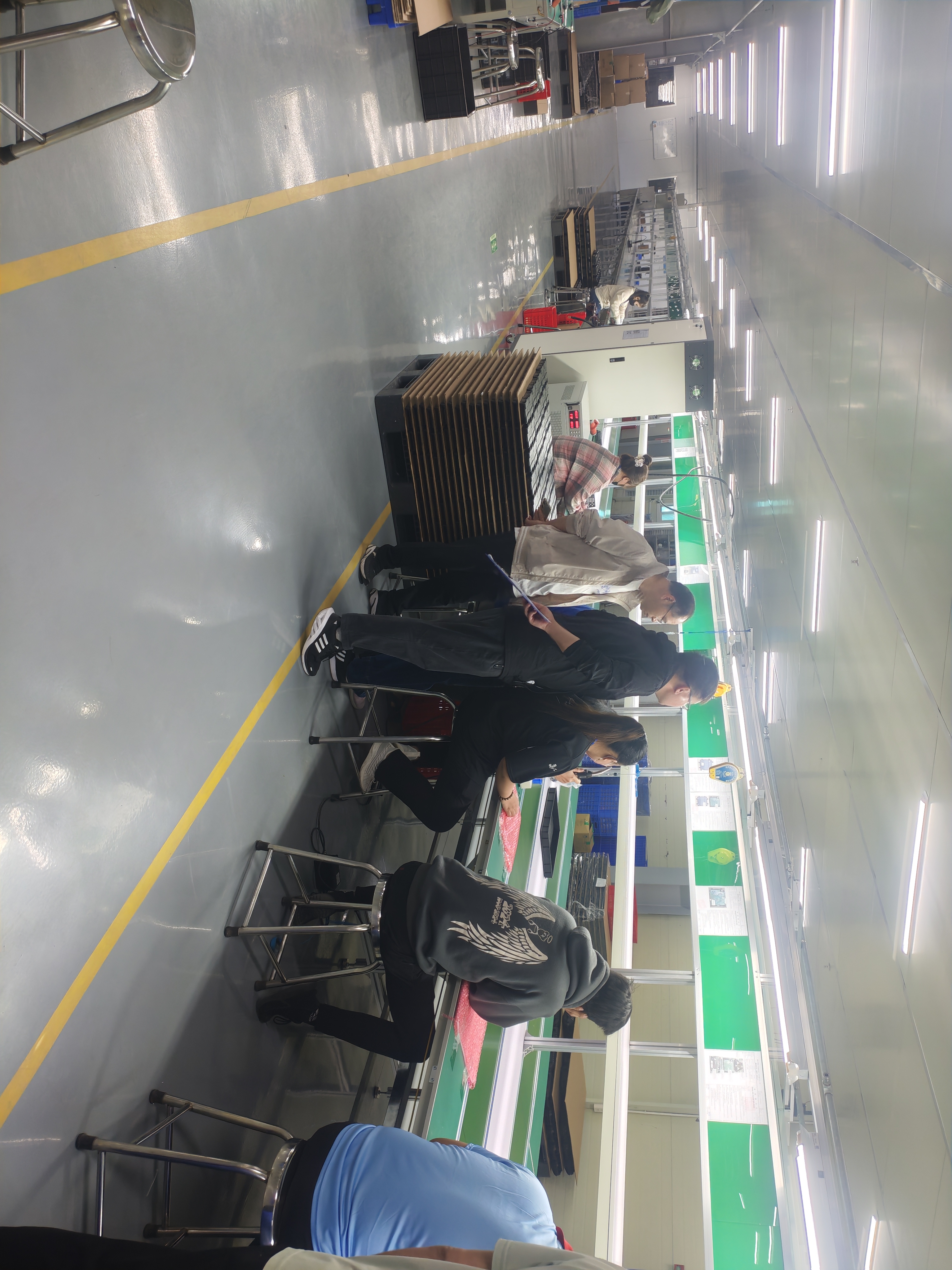 Customer QC team auditing inverter and charger production line at New Power Technology Vietnam factory